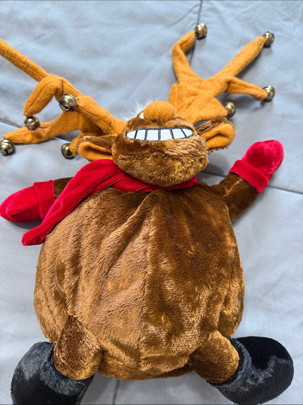 Plush Reindeer singing in Brown with Red Scarf “grandma got ran over by a reinde
